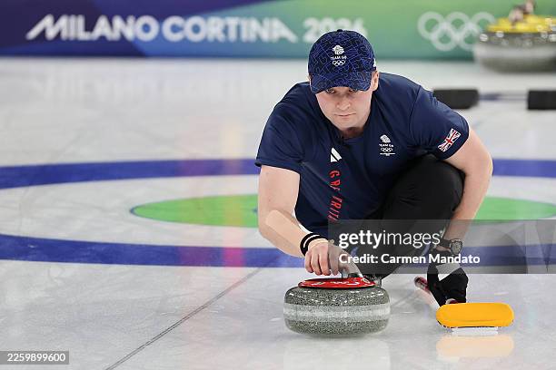 Bruce Mouat of Team Great Britain thows a stone during Mixed Doubles round robin play against Team Norway on day minus two of the Milano Cortina 2026...