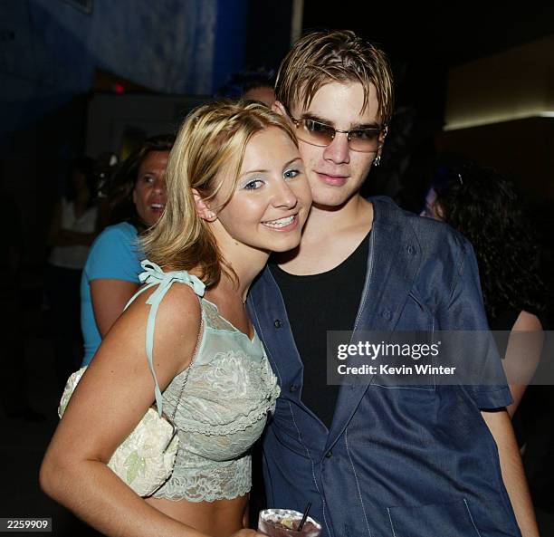 Beverley Mitchell and David Gallagher, "7th Heaven", at WB Television Network's 2002 Summer Party at the Renaissance Hollywood Hotel in Los Angeles,...