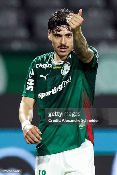 Mauricio of Palmeiras celebrates after scoring his team's third goal during a Brasileirao 2026 match between Palmeiras and Vitoria at Arena Barueri...