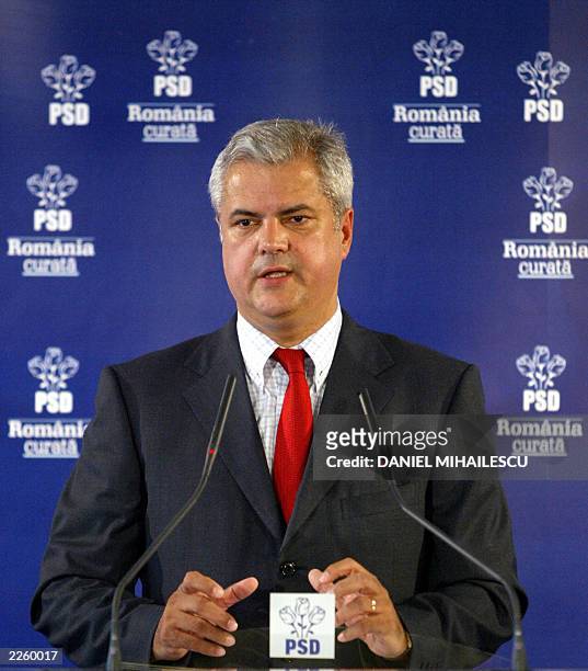 Romanian Prime Minister Adrian Nastase gives a speech to announce a governement reshuffle at the headquarters of the ruling Social-Democrat Party in...