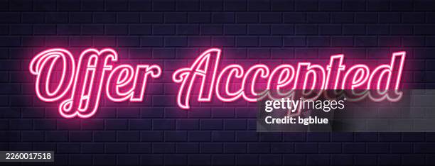 offer accepted - glowing neon text on brick wall background - auction background stock illustrations
