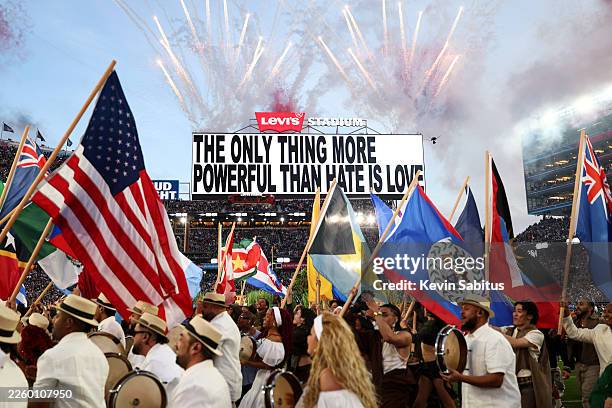 Bad Bunny performs in the Apple Music Halftime Show during the NFL Super Bowl 60 football game between the Seattle Seahawks and the New England...