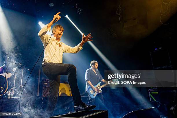 Brett Anderson, lead singer of Uk band Suede, performs on stage at Liverpool University. UK band Suede performing on stage at Liverpool University,...