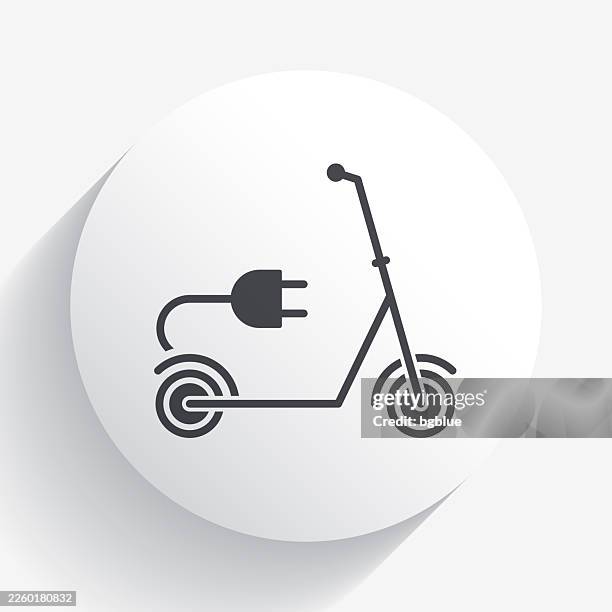 electric scooter with plug. icon on circle button with long shadow - electrical wire white background stock illustrations