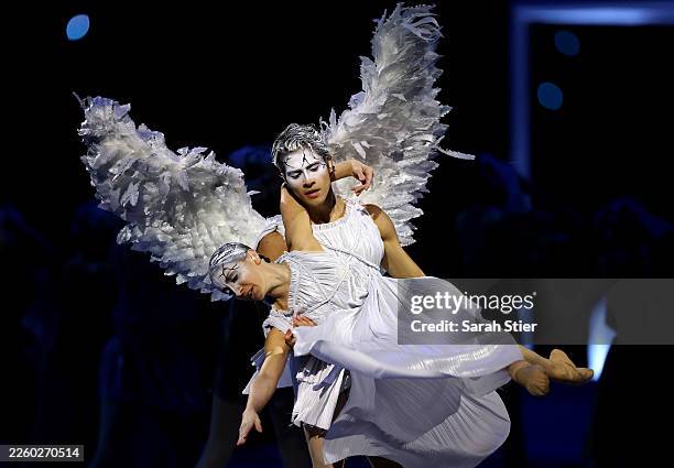 Cupid & Psyche perform a tribute to Italian beauty during the opening ceremony of the Milano Cortina 2026 Winter Olympics at San Siro Stadium on...