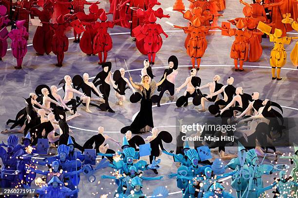 Matilda De Angelis performs during the opening ceremony of the Milano Cortina 2026 Winter Olympics at San Siro Stadium on February 06, 2026 in Milan,...