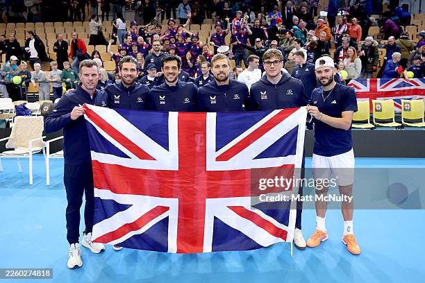 Players of Team Great Britain pose for a picture after their victory during the Davis Cup Qualifier first round match between Norway and Great...