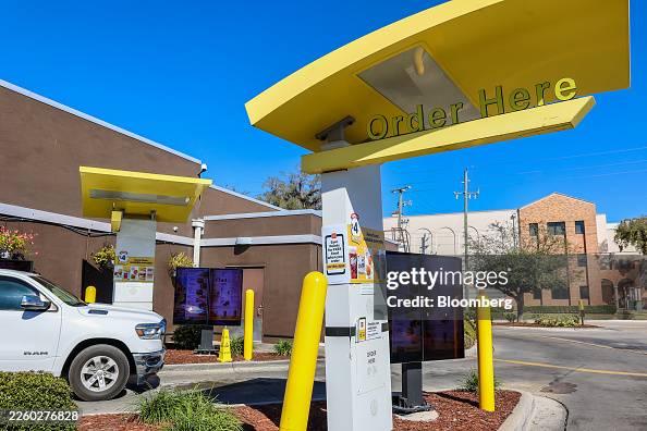 A vehicle in the drive thru of a McDonald's restaurant in LaBelle ...