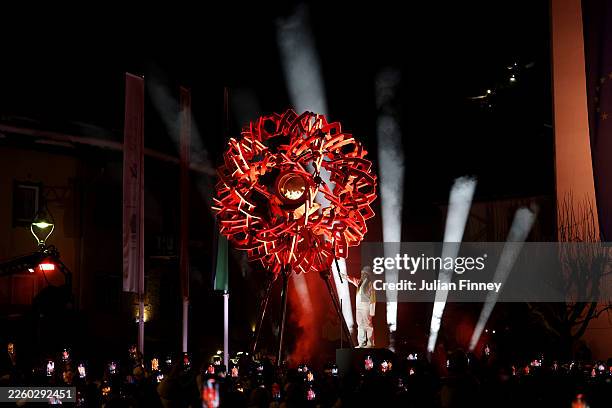 Sofia Goggia lights the Olympic cauldron at the Angelo Dibona Square during the opening ceremony of the Milano Cortina 2026 Winter Olympics at Piazza...