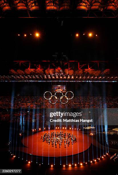General view of Samanta Cristoforetti, European Space Agency astronaut, carrying a bright sun during the opening ceremony of the Milano Cortina 2026...
