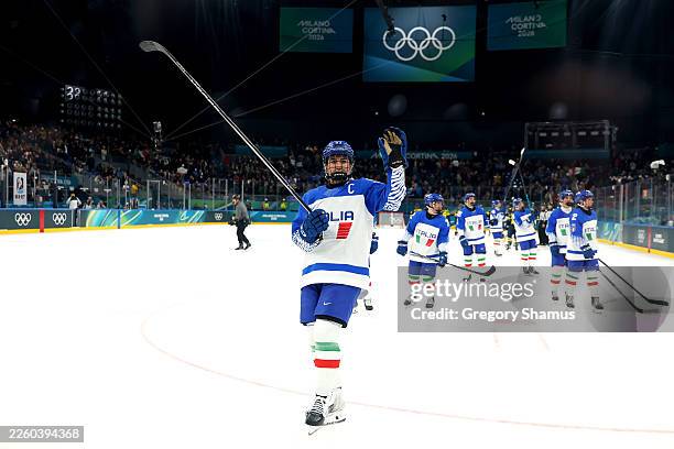 Nadia Mattivi and players of Team Italy applaud fans after the team's 1-6 defeat in the Women's Preliminary Group B match between Sweden and Italy on...