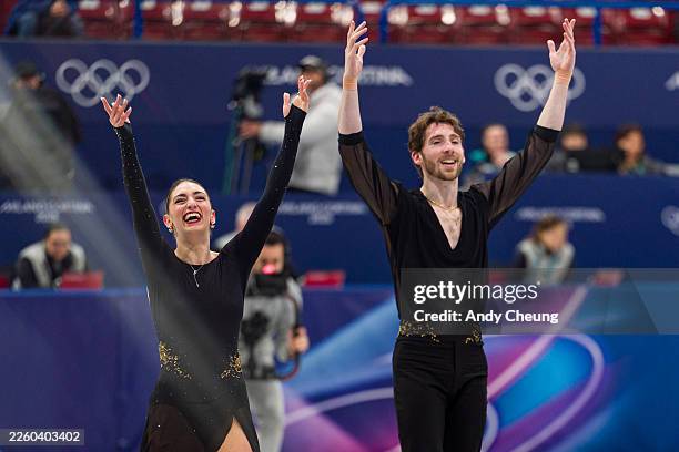 Sara Conti and partner Niccolo Macii of Team Italy acknowledge the crowd after competing in the Pair Skating - Short Program on day zero of the...