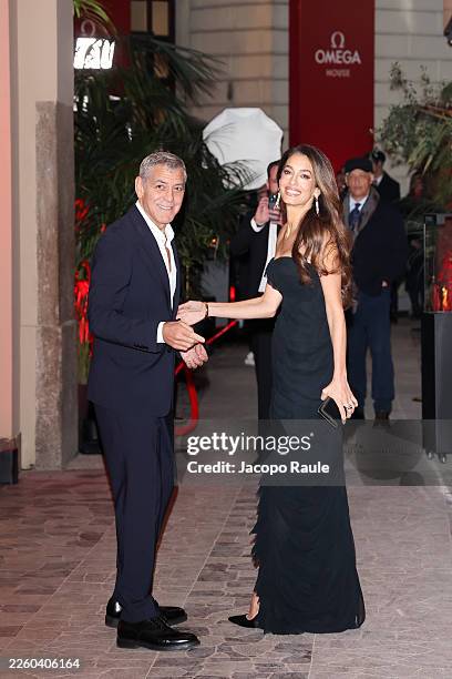 George Clooney and Amal Clooney attend the Omega House opening night during Milano Cortina 2026 Winter Olympics at Omega House on February 07, 2026...