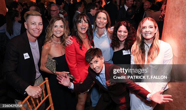 Actress producer Tig Notaro poses with guests as she attends the 98th Oscars Nominees Luncheon at the Beverly Hilton hotel in Beverly Hills,...