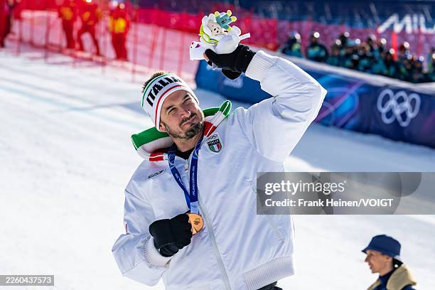 Bronze Medalist Dominik Paris of Team Italy poses for a picture with the Medal after the medal ceremony for the Men Downhill on day one of the Milano...