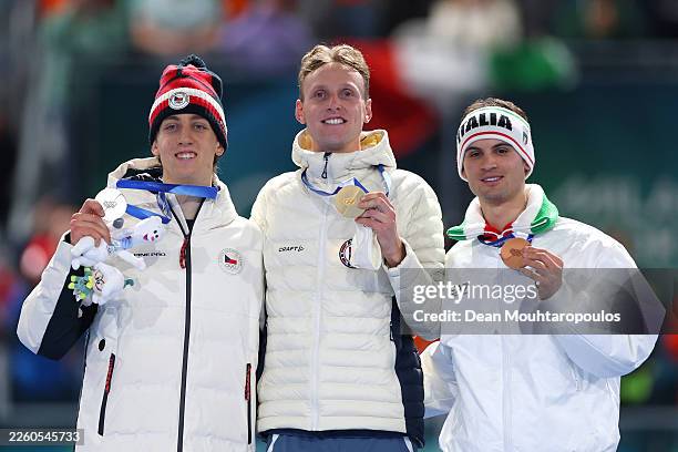 Gold medalist Sander Eitrem of Team Norway, Silver medalist Metodej Jilek of Team Czechia, and Bronze medalist Riccardo Lorello of Team Italy pose...