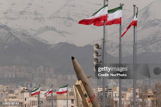 An Iran-made ballistic missile is displayed during a rally commemorating the 47th anniversary of the Islamic Revolution's victory in Azadi Square in...