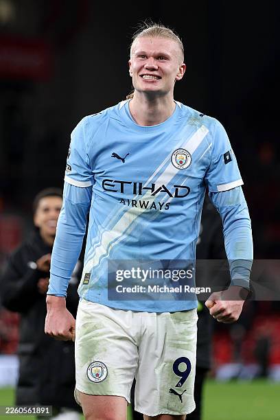 Erling Haaland of Manchester City celebrates following the team's victory during the Premier League match between Liverpool and Manchester City at...