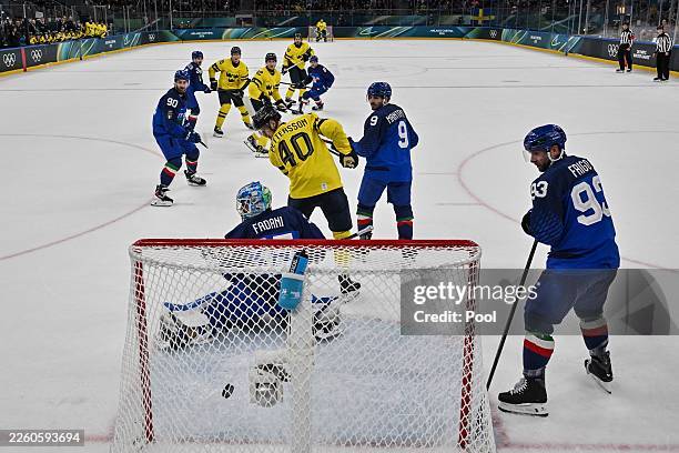 Mika Zibanejad of Team Sweden shoots and scores his team fourth goal during the men's preliminary round Group B Ice Hockey match between Sweden and...