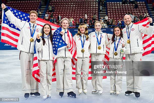 Gold medalists of Team United States pose for a photo after the medal ceremony for the Team Event on day two of the Milano Cortina 2026 Winter...