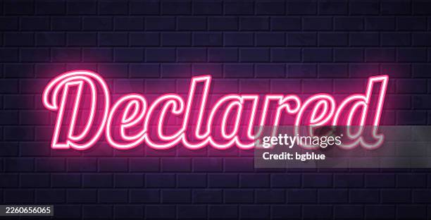 declared - glowing neon text on brick wall background - confession stock illustrations