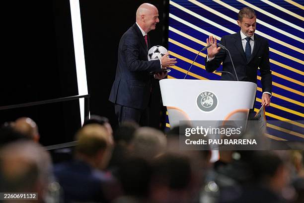 President Gianni Infantino speaks with UEFA president Aleksander Ceferin after addressing the 50th UEFA Ordinary Congress in Brussels on February 12,...