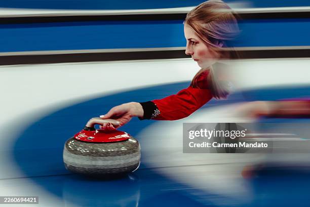 Briar Schwaller-Huerlimann competes with Yannick Schwaller of Team Switzerland in their match against Team Canada during mixed doubles round robin on...