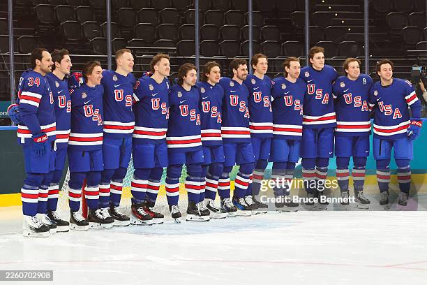 Players of Team United States pose for photographs during training on day three of the Milano Cortina 2026 Winter Olympic games at Milano Santagiulia...