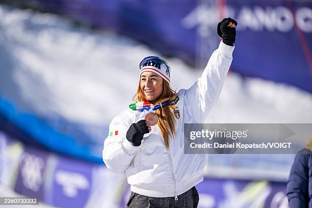 Bronze Medalist Sofia Goggia of Team Italy celebrates during the medal ceremony for placing third at the Women´s Downhill run on day two of the...