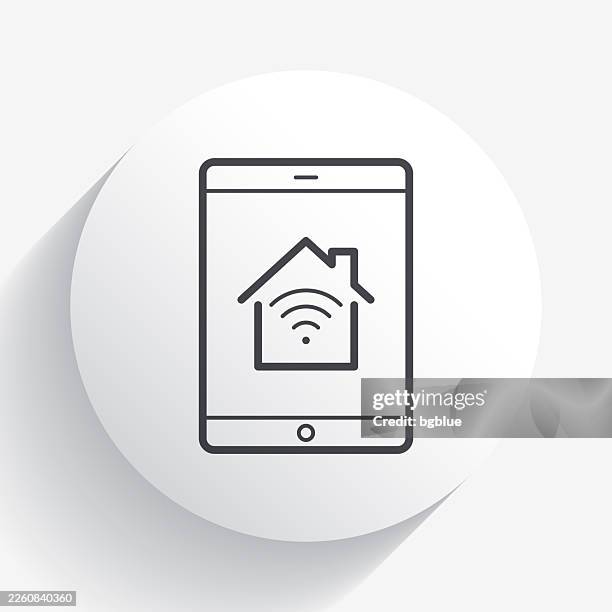tablet pc with smart home. icon on circle button with long shadow - using tablet home stock illustrations