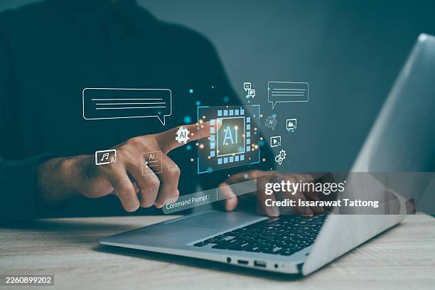 man interacting with ai chatbot prompt on laptop representing artificial intelligence, generative technology, virtual assistant, smart content creation interface, and modern multimedia innovation - creation stock pictures, royalty-free photos & images