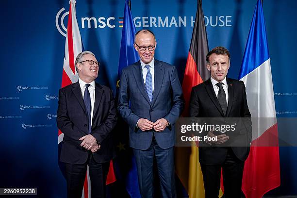 British Prime Minister Keir Starmer, German Chancellor Friedrich Merz and France's President Emmanuel Macron at the start of the E-3 meeting during...