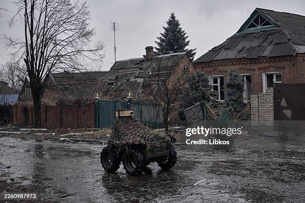 An unmanned ground vehicle, UGV, loaded with supplies moves through the streets of Kostyantynivka toward Ukrainian military positions as the Armed...
