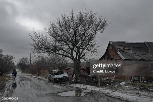 Ukrainian soldier walks through the city of Kostyantynivka in the Donetsk region as fighting continues nearby and the city remains under constant...