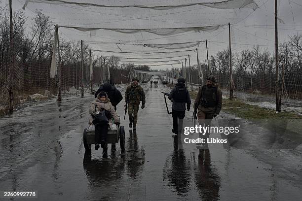Protective nets above a road between Druzhkivka and Kostyantynivka as mobile fire groups patrol the area to intercept and shoot down Russian FPV...