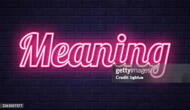 meaning - glowing neon text on brick wall background - meaningful stock illustrations