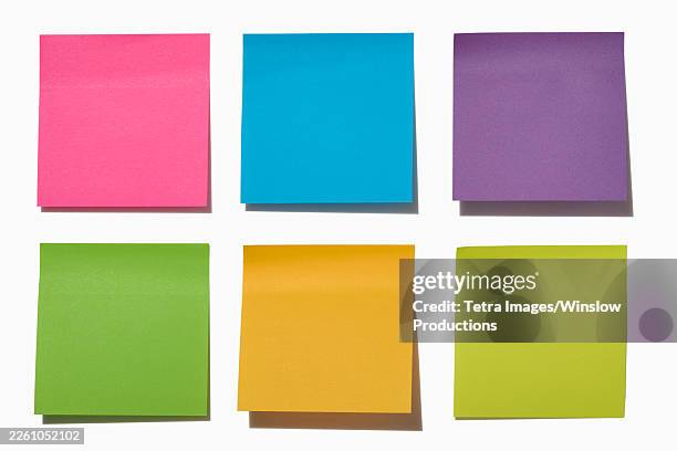 colorful post it notes on white background - papel adesivo imagens e fotografias de stock