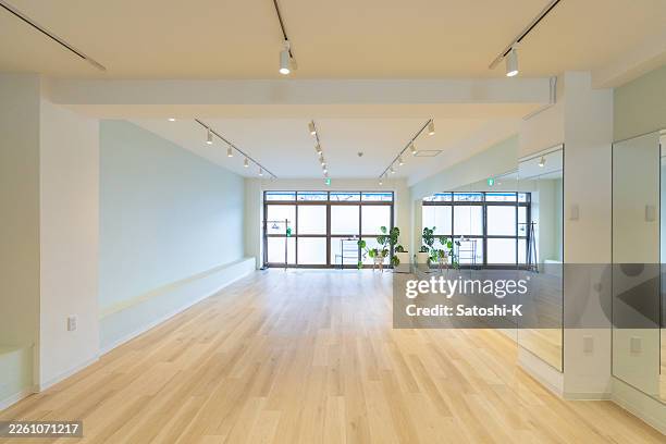 wide view of bright dance studio - empty dance studio stock pictures, royalty-free photos & images