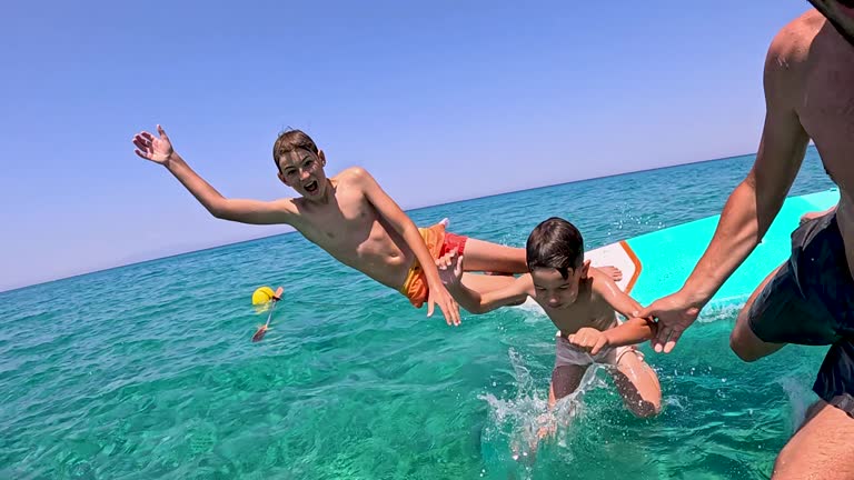 https://media.gettyimages.com/id/2261077333/video/jumping-into-the-sea-off-the-paddleboard.jpg?b=1&s=640x640&k=20&c=RgSvFFJy4NmwC32QkmGCKR89A3BfpQX_kW_P7cm_trg=