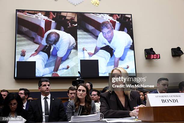 Photo of Andrew Mountbatten Windsor is displayed as U.S. Attorney General Pam Bondi testifies before the House Judiciary Committee in the Rayburn...