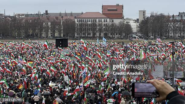 Protesters gather, waving Iranian flags and chanting slogans in support of the Iranian people, as global leaders assembled in the city for the annual...