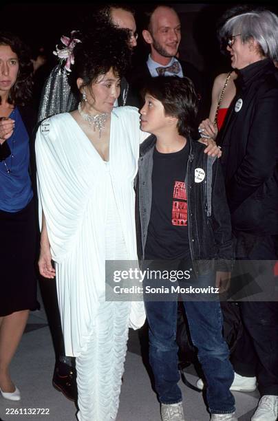 Yoko Ono and Sean Lennon attend the American Foundation for AIDS Research Benefit at the Jacob Javits Convention Center on May 4, 1986 in New York...