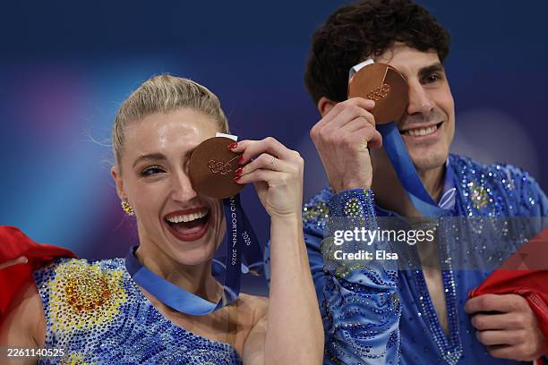 Bronze medalists Piper Gilles and partner Paul Poirier of Team Canada poses for a photo after the medal ceremony for Ice Dance on day five of the...