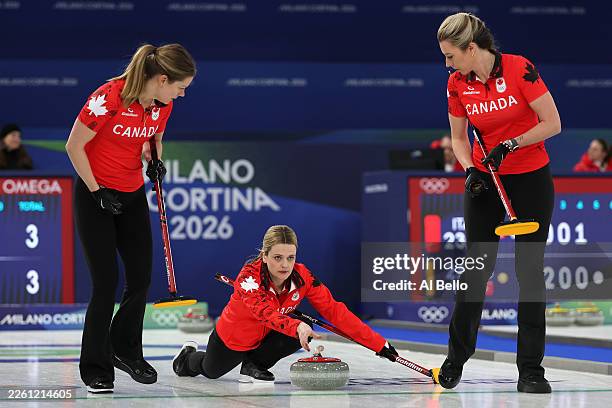Sarah Wilkes, Tracy Fleury and Emma Miskew of Team Canada compete during the Women's Round Robin match between Team Canada and Team Denmark on day...