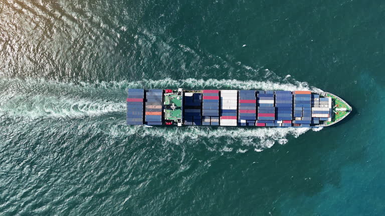 https://media.gettyimages.com/id/2261219008/video/cargo-container-ship-carrying-container-export-cargo-from-cargo-yard-port-to-other-ocean.jpg?b=1&s=640x640&k=20&c=nTPTgVDC0aNHjDCWPGZ156ltdtLWRqEWtrAag_vr29A=