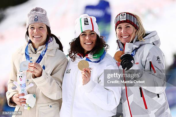 Gold medalist Federica Brignone of Team Italy, Silver medalist Romane Miradoli of Team France and Bronze medalist Cornelia Huetter of Team Austria...