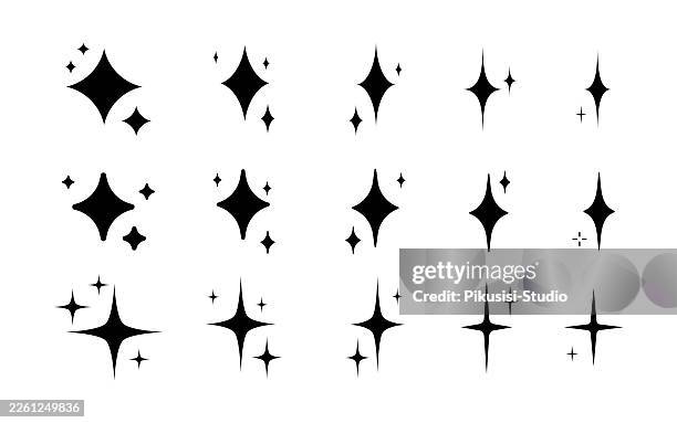 black sparkle star elements set isolated on white background - disco ball stock illustrations