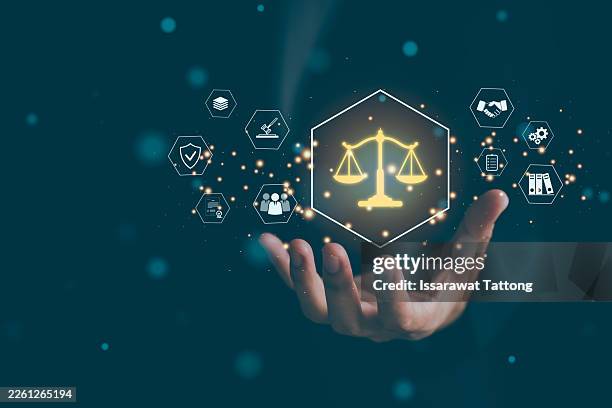 legal technology concept showing professional displaying virtual justice interface with documents, regulation and business compliance framework - regeln stock-fotos und bilder
