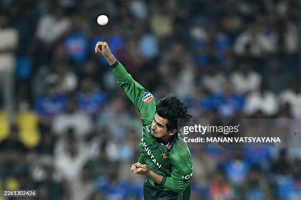 Pakistan's Saim Ayub delivers a ball during the 2026 ICC Men's T20 Cricket World Cup group stage match between India and Pakistan at the R Premadasa...