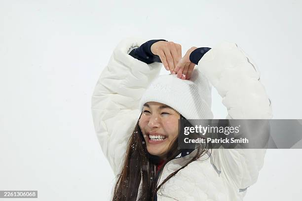 Silver medalist Chloe Kim of Team United States celebrates during the medal ceremony for the Women’s Snowboard Halfpipe on day six of the Milano...